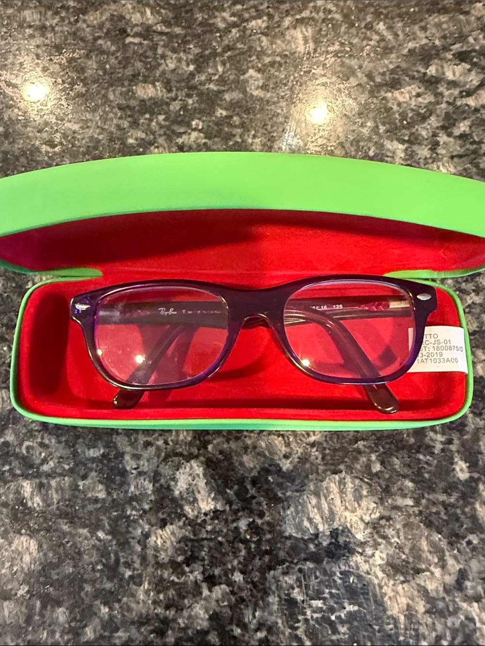 Purple RayBan glasses